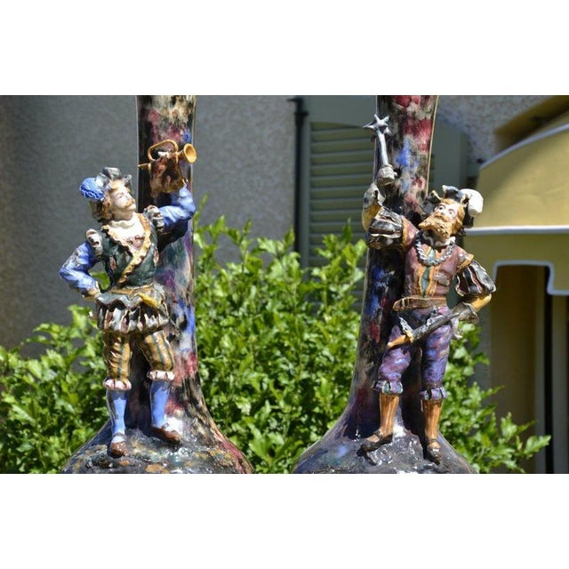 Period: 19th century Style: Renaissance, Louis 13th Condition: Good condition Pair of large glazed polychrome ceramic...