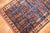 An early 21st Century Persian Rug with an all over willow tree design on an indigo field
