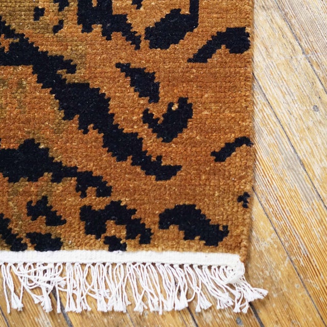Adapted from one of our original textile designs, Bengal is a classic striped tiger pattern that is hand-knotted in a deep...