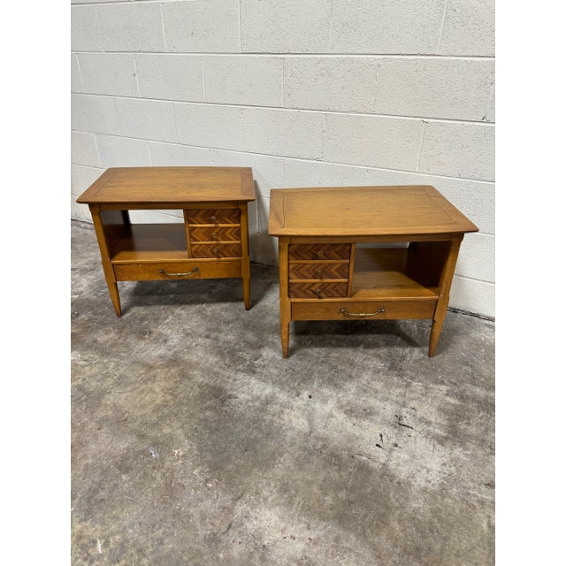 Unusual pair if Tomlinson walnut nightstands or end tables with “rare face veneers” on the front of the drawers. Open...