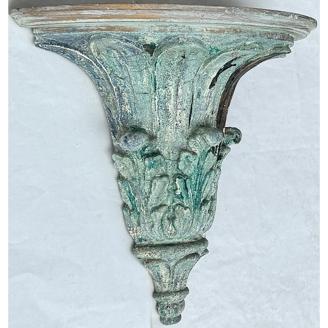 Mid-century Italian Palladio bracket with Hollywood Regency flair and Old World patina. A vintage Italian wall bracket by...