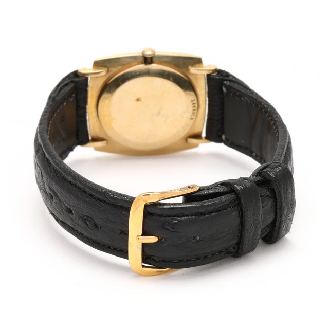 Vintage circa 1965 Omega ref. D6660 manual wind wristwatch in an 18K yellow gold cushion-shaped case with Florentine...