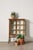 19th Century English Tortoise Bamboo 2-Door Glass Front Cabinet with three shelves, featuring richly toned bamboo...