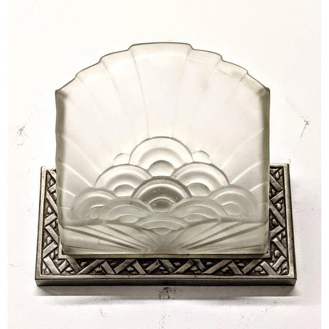 Stunning pair of French Art Deco sconces were created by the French artist " Charles Schneider " in good condition. Marked...