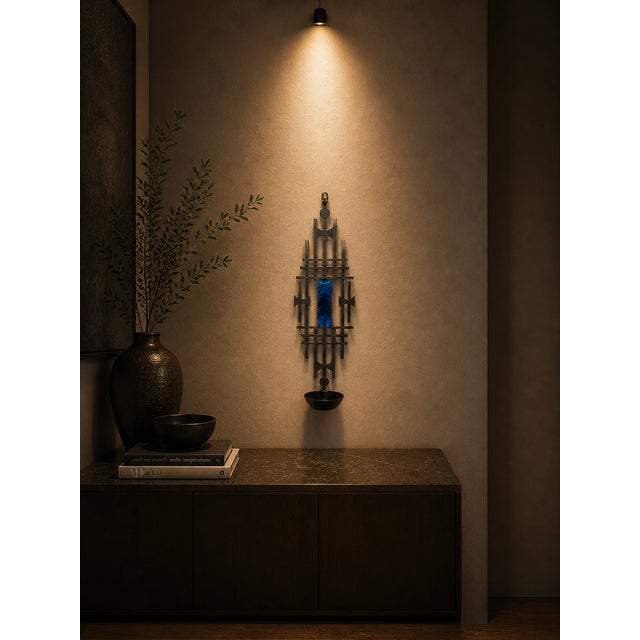 This large Danish brutalist wall candleholder was produced by Dantoft in Denmark during the 1960s, a period marked by...
