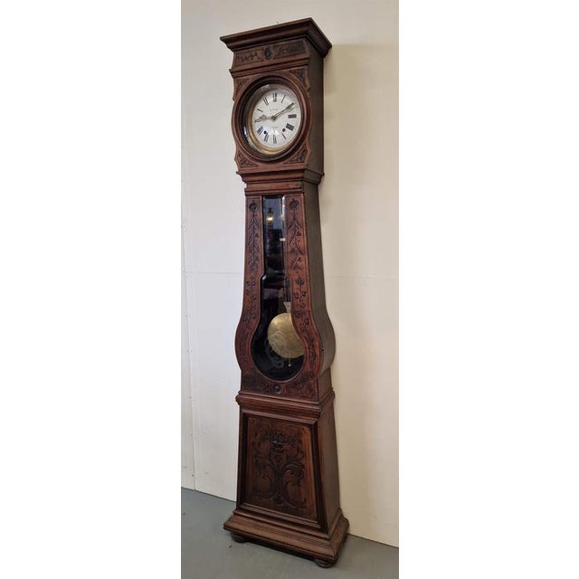 Majestic floor clock.Bte FAUCHE a St Savin clock mechanism.Walnut case, faceted and engraved...