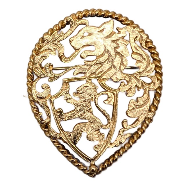 Vintage 1970s Signed Napier Goldtone Cut Out Rearing Lion Coat of Arms Brooch For Sale