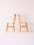 Pair of vintage Scandinavian wooden pinnstolar chairs, with birch structure and teak seat, characterized by a wooden frame...