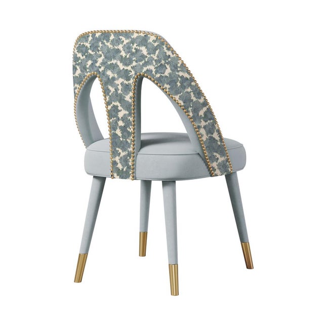 Inspired by Paris, the charming capital of lovers, the Mid-Century Modern Caron Dining Chair exhibits a fascinating and...