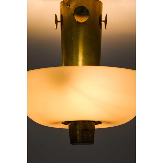 Modern Scandinavian Ceiling Lamp in Brass and Opaline Glass by Paavo Tynell, 1950s For Sale - Image 10 of 11