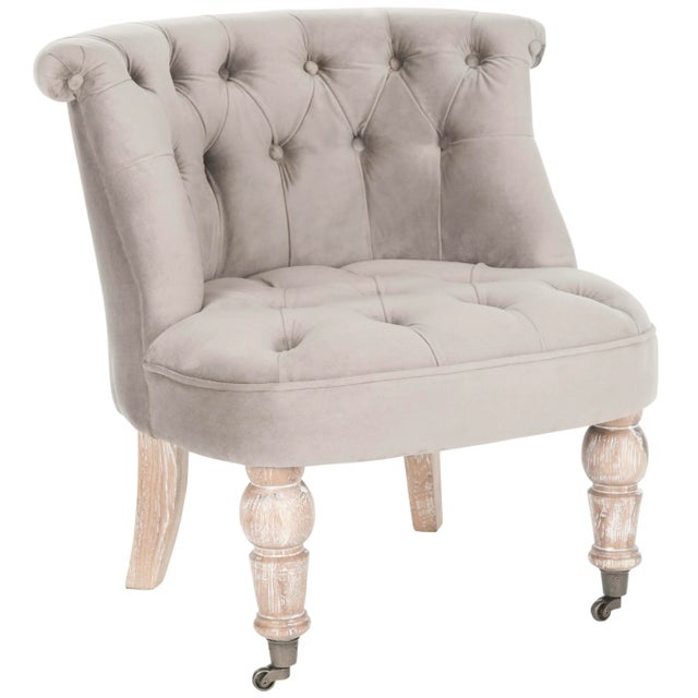 Our Barrel-back tufted chair, upholstered in mushroom taupe cotton velvet, is full of tradition. Inspired by 18th English...