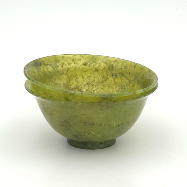 A pair of green hardstone bowls, possibly jade, Republic Period China.