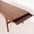 Stunning large Scandinavian rosewood coffee table with an extension leaf and a compartmentalized drawer. A quality piece...