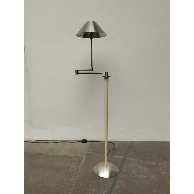 Elegant standing lamp with swivel arm in the design of postmodernity around 1980. The high -quality workmanship shows,...
