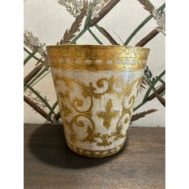 Handmade Italian gold gilt and white waste basket with liner. Normal wear and tear that develops over time but it is in...