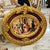 Bring the elegance of a grand European salon into your home with this distinctive oval artwork, featuring a richly...