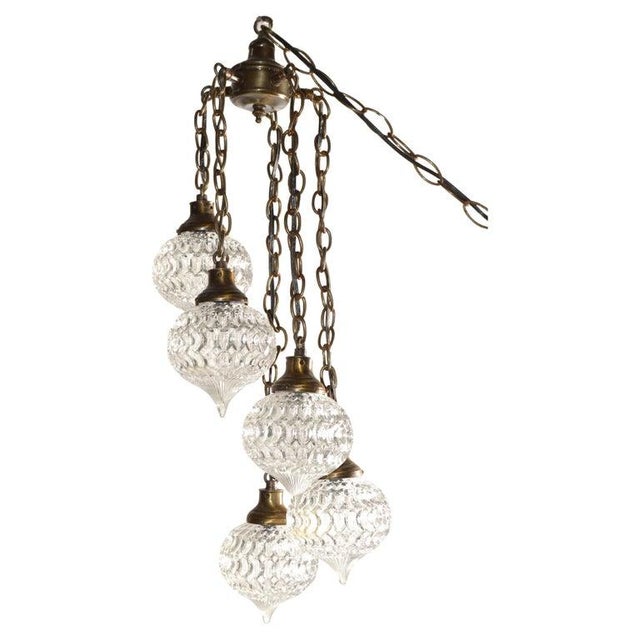 1970s French inspired 5 pagoda shaped molded and pressed Glass Ornaments Swag Light Fixture. This is made to plug in and...