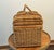 Charming vintage woven wicker picnic basket featuring a warm honey-toned patina and classic craftsmanship. This basket has...