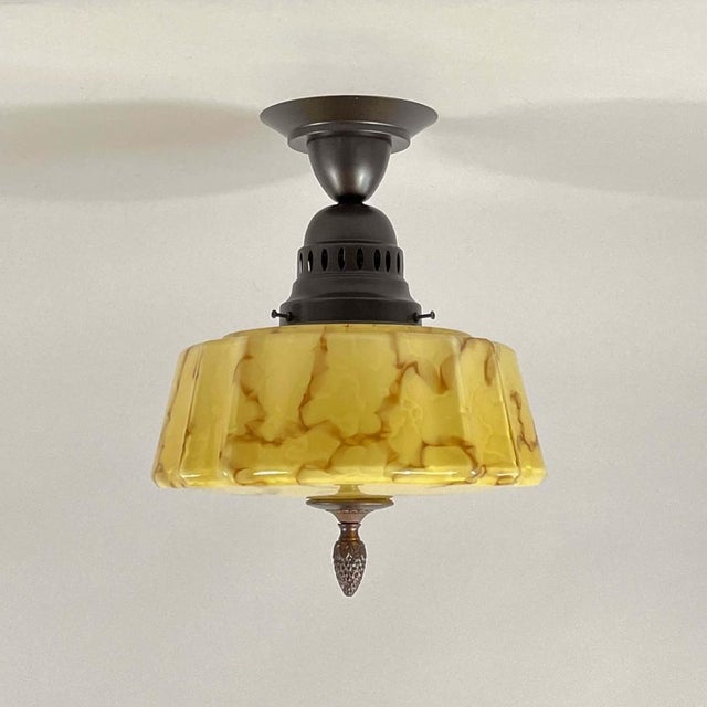 This elegant art deco flush mount was designed and manufactured in germany in the 1920s to 1930s during the bauhaus...