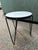 Iconic hair-pin end table was originally designed by Henry P. Glass in 1941. He created it at the time when materials and...