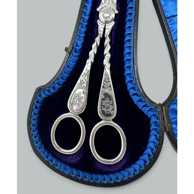 An exceptionally fine quality example of an English Sterling Silver Grape Scissors. Late Nineteenth Century. Wonderful...