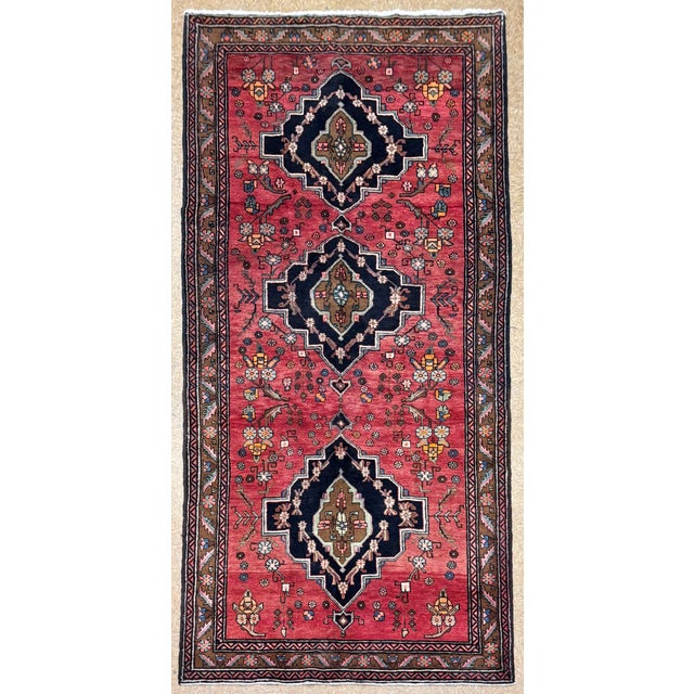 Antique hand-knotted runner from the Meshkin (Meshkin Shahr) region of northwest Iran, featuring a series of three large...
