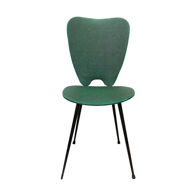 Vintage 1960s green vinyl chair with black steel metal legs. This is missing one foot peg. Please see photos. One...