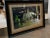 Custom framed original photo of an authentic cigar roller in Cuba, specially matted with Maya Romanoff wallcovering. Frame...