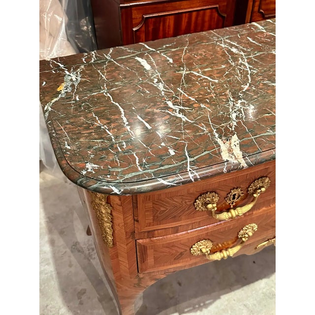 Early 18th Century French Kingwood Marquetry Commode. Original Marble top and ormolu mounts. Wonderful color. Regence...