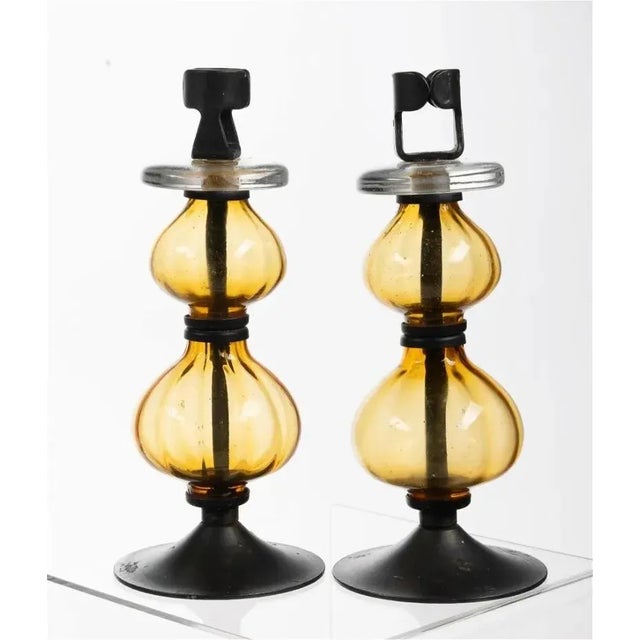 Erik Hoglund (1932-1998) candle chandelier with matching pair of candlesticks. Chandelier has six arms. Both have enameled...