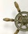 Circa 1940s cast iron Wilcox Crittenden boat steering wheel stamped with "WC", has wood handles. Steering wheel has...