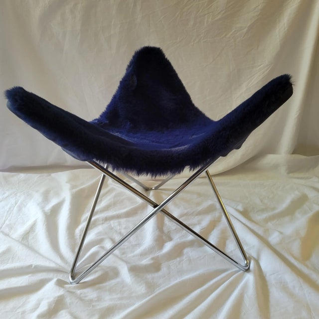 Fun bauhaus tripod footrest. This vintage piece previously had a broken leather sling, which was replaced with a new blue...