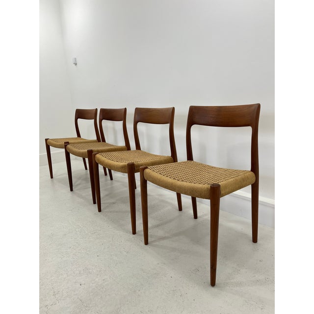 4 Chairs from the Danish designer Niels Otto Moller. Chair frame of teak wood. Seat upholstery of raffia. Very good...
