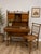An exceptionally rare late 19th-century American Aesthetic Movement secretary desk with its matching hand-caned chair,...