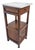 Add a touch of classic French sophistication to your home with this stunning antique 1920s French oak nightstand....