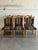 This set of 6 dining chairs showcases carved wooden frames and high backrests. Vintage 1970s. Crafted from solid oak In...