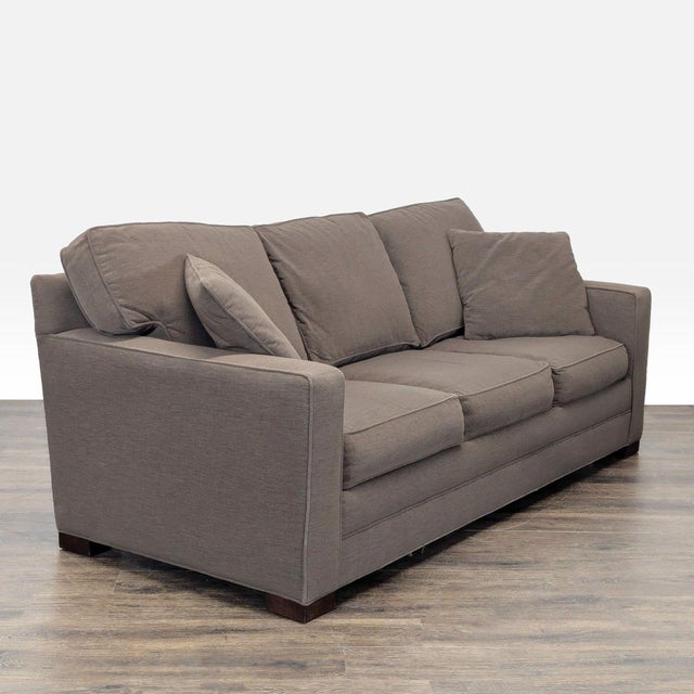 This Lee Industries sleeper sofa features a clean, modern design with a neutral fabric that fits easily into any space. It...
