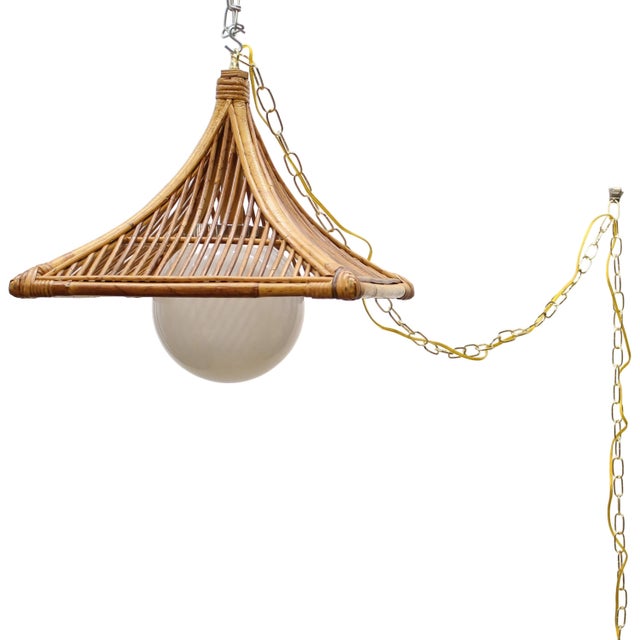 Large square bamboo frame over a white glass orb light. On/off switch on cord, long brass finish chain. Condition: Very...