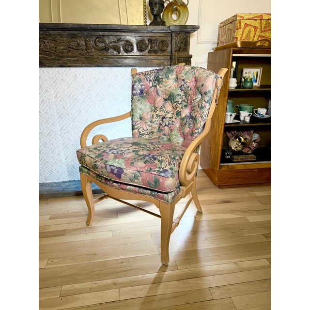 A charming vintage Bernhardt lounge chair from the 1990s featuring a vibrant botanical fruit print that perfectly captures...