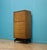 A mid-century G Plan Tola tallboy chest of drawers, dating to the 1950s. Featuring seven drawers and finished in warm tola...