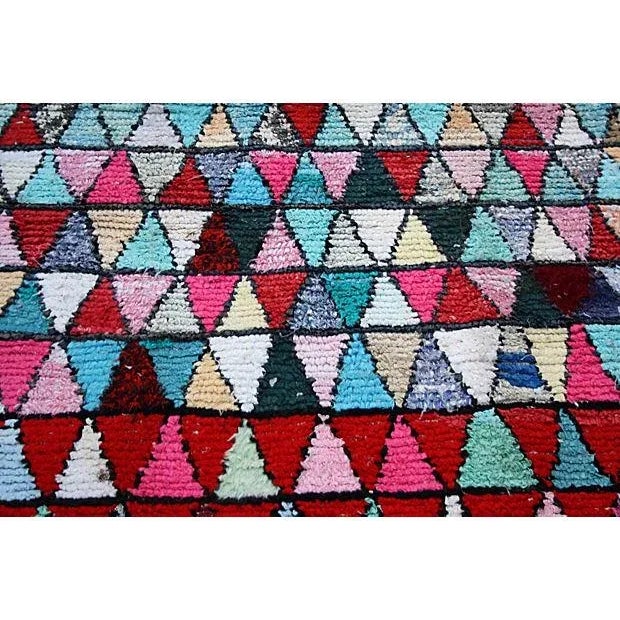 One-of-a-kind handwoven Moroccan wool rug featuring a pattern of diamonds and intricate Berber graphics. This beautiful...