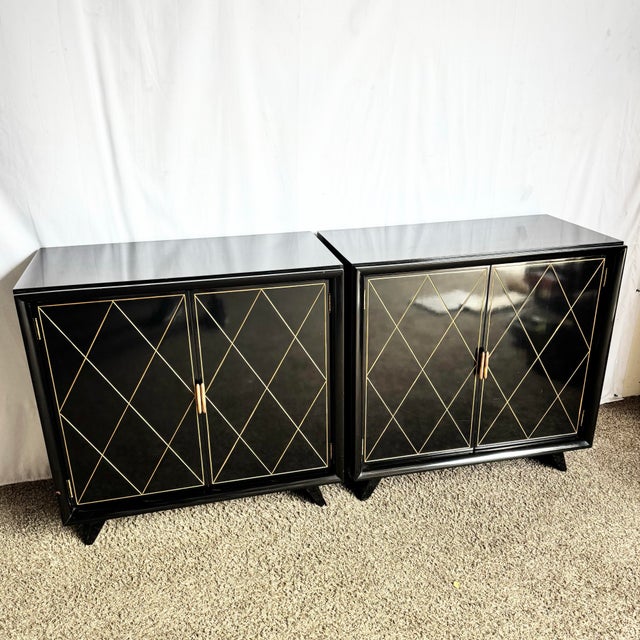 Elegant and timeless, this pair of Art Deco chests showcases the glamour of early 20th-century design. The black lacquered...