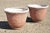Red Pair of Vtg Red Distress Painted Fiberglass Round Garden Planter Pots Faux Stone For Sale - Image 8 of 9