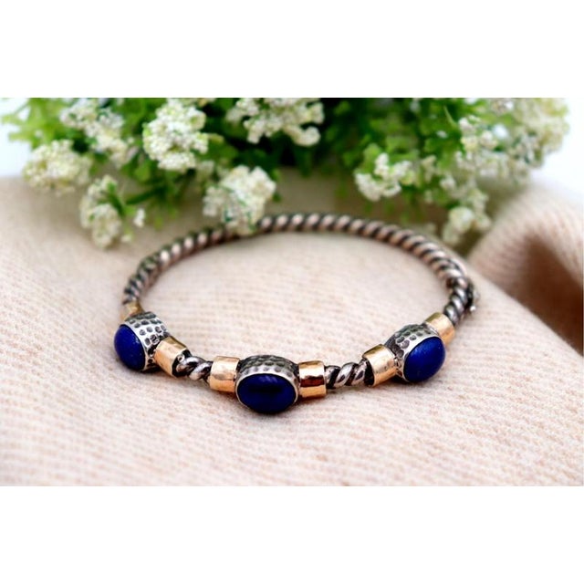 Gold Bracelet and Paw, in Worn conditions. Designed 1980 to 1989