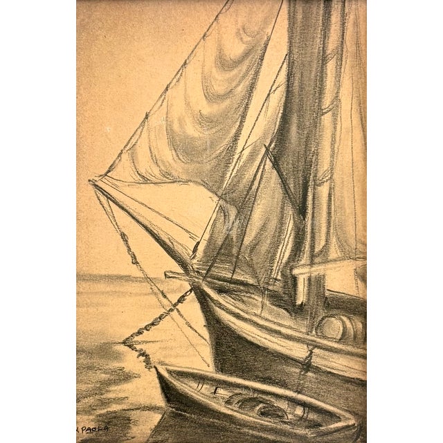 This vintage charcoal and pencil drawing on board.features a nautical scene with a sailboat and a dinghy anchored on a...