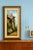 Offering a vintage 1986 original Scarlet Macaw Parrot painting on canvas board surrounded by a beige linen fillet and...