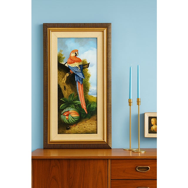 Offering a vintage 1986 original Scarlet Macaw Parrot painting on canvas board surrounded by a beige linen fillet and...