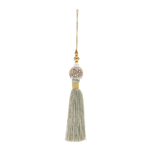 Add a touch of glamorous elegance to your holiday decor with this set of Jeweled Tassel Ornaments. Featuring wintry gold...