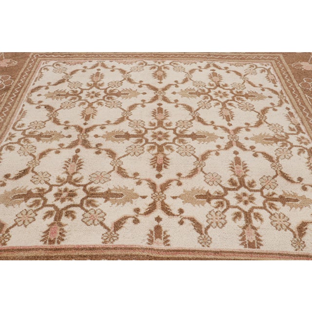 Hand-knotted wool circa 1910-1920, this 9x9 square rug is believed to be a rare antique Agra rug from India with...