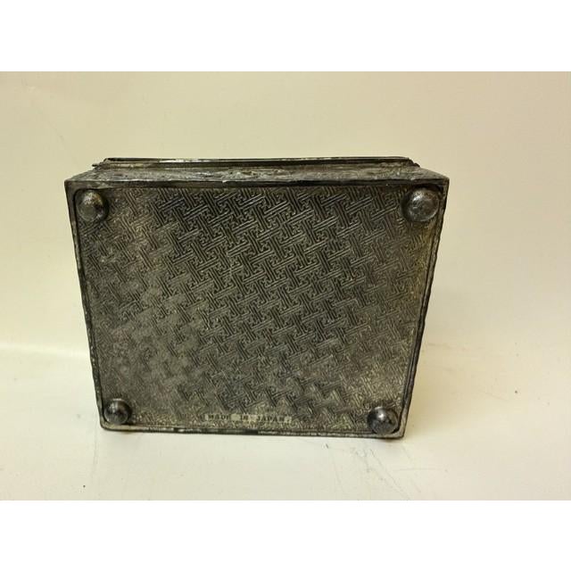 Elevate your vanity, desk, or bookshelf with this striking early 20th-century Japanese mixed-metal trinket box. The heavy-...